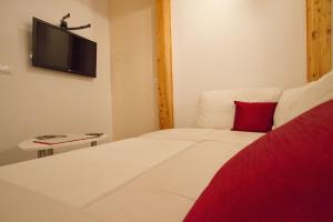 Posteľ alebo postele v izbe v ubytovaní Apartmani Nighty Night
