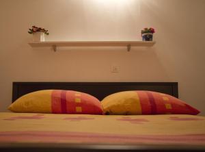 Posteľ alebo postele v izbe v ubytovaní Apartmani Nighty Night