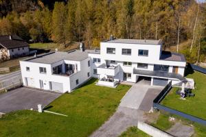 an aerial view of a white house at Lindes Appartement in Umhausen