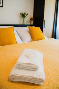 Katil atau katil-katil dalam bilik di Apartmán PMR