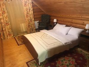 Postel nebo postele na pokoji v ubytování Cottage Karinka