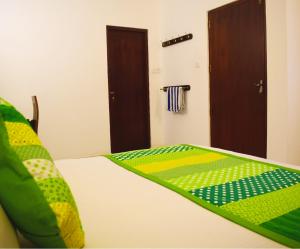 A bed or beds in a room at White Fortress