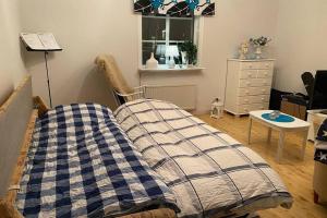 Postel nebo postele na pokoji v ubytování Guesthouse