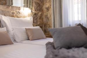 Postel nebo postele na pokoji v ubytování Sea La Vie Apartments