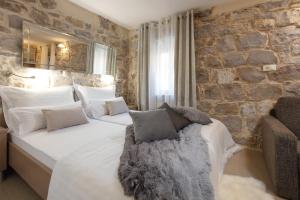 Postel nebo postele na pokoji v ubytování Sea La Vie Apartments