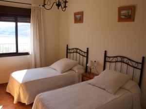 Postel nebo postele na pokoji v ubytování Villa in Málaga near Mediterranean Coast
