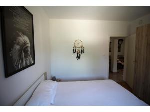 Ένα ή περισσότερα κρεβάτια σε δωμάτιο στο Holiday Home in Dalmatia near Krka NP