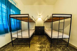 Postel nebo postele na pokoji v ubytování Colombo Beach Hostel