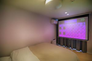 A bed or beds in a room at Fujiyasan