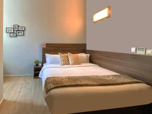 Voodi või voodid majutusasutuse ST Signature Bugis Beach, DAYUSE, 5 Hours, 4PM-9PM toas