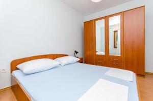 Krevet ili kreveti u jedinici u objektu Apartment Ruza