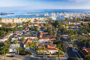 an aerial view of a coastal town with a harbor at Harbor House Inn in Santa Barbara