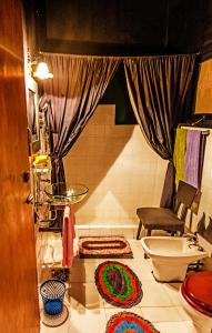 a bathroom with a toilet and a sink at HELGASFOLLY Anti Hotel Residence in Kandy