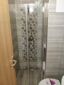 Kúpeľňa v ubytovaní Apartments Poljanak
