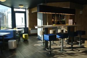 Posezení v ubytování ibis budget Chambéry Sud Challes Les Eaux
