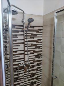 Kúpeľňa v ubytovaní Apartments Poljanak
