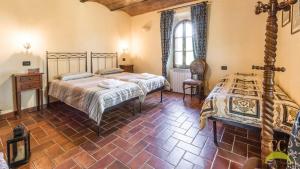 Postel nebo postele na pokoji v ubytování Colle Cavalieri - Country House + 37 fotografií