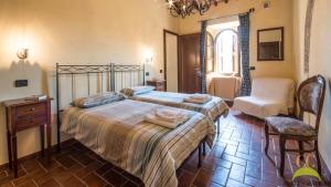 Postel nebo postele na pokoji v ubytování Colle Cavalieri - Country House