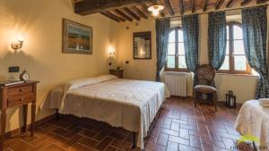 Postel nebo postele na pokoji v ubytování Colle Cavalieri - Country House