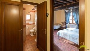 Postel nebo postele na pokoji v ubytování Colle Cavalieri - Country House