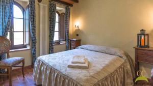 Postel nebo postele na pokoji v ubytování Colle Cavalieri - Country House