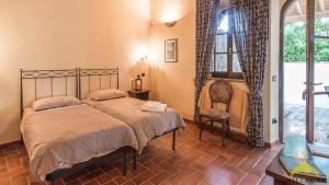 Postel nebo postele na pokoji v ubytování Colle Cavalieri - Country House