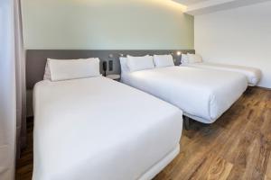 Postel nebo postele na pokoji v ubytování B&B HOTEL Madrid Alcorcón