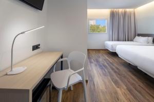 Postel nebo postele na pokoji v ubytování B&B HOTEL Madrid Alcorcón