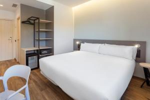 Postel nebo postele na pokoji v ubytování B&B HOTEL Madrid Alcorcón