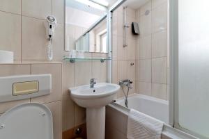 Ванная комната в Hotel Perla