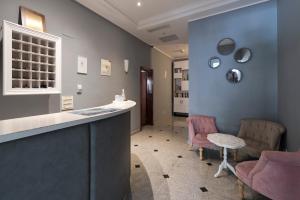 Гостиная зона в Hotel Perla