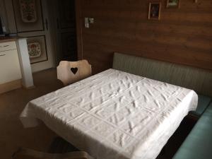 A bed or beds in a room at Haus Eiter