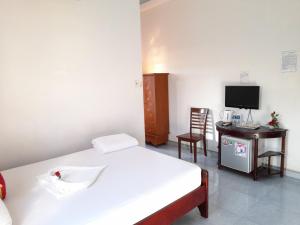 TV a/nebo společenská místnost v ubytování Minh Ngoc Hotel