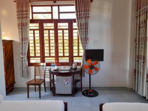 Et opholdsområde på Minh Ngoc Hotel
