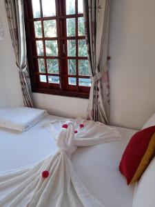 Postel nebo postele na pokoji v ubytování Minh Ngoc Hotel