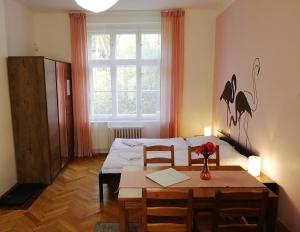 Posteľ alebo postele v izbe v ubytovaní Flamingo Apartments