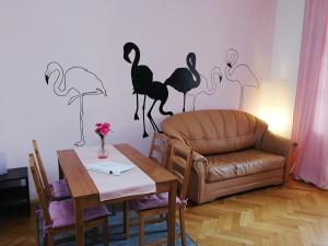 Posedenie v ubytovaní Flamingo Apartments
