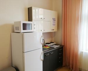 Kuchyňa alebo kuchynka v ubytovaní Flamingo Apartments