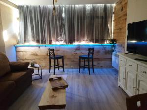 A television and/or entertainment centre at Apartamento El sarrio