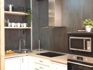 A kitchen or kitchenette at Apartamento El sarrio