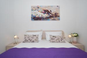 Posteľ alebo postele v izbe v ubytovaní Apartman "Mary"