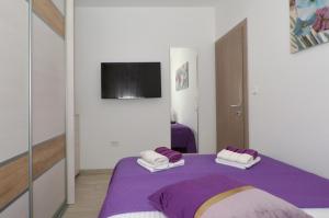 Posteľ alebo postele v izbe v ubytovaní Apartman "Mary"