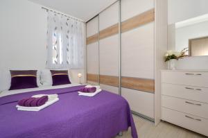 Posteľ alebo postele v izbe v ubytovaní Apartman "Mary"