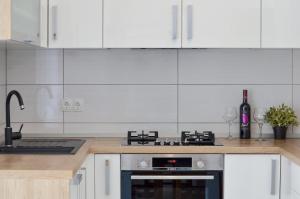 Kuchyňa alebo kuchynka v ubytovaní Apartman "Mary"
