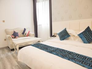 Fotografie z fotogalerie ubytování Shell Wuxi Huishan DistrictWanda Plaza Yanqiao Subway Station Hotel v destinaci Wu-si + 17 fotografií