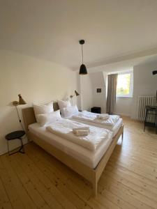 מיטה או מיטות בחדר ב-Fabelhaus