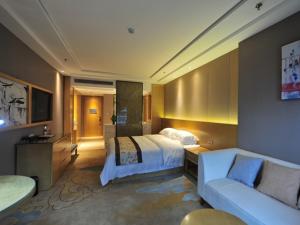 Krevet ili kreveti u jedinici u okviru objekta GreenTree Eastern Jinzhai County Lotus Hill Road Hotel