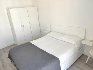 Posteľ alebo postele v izbe v ubytovaní Atico Condal