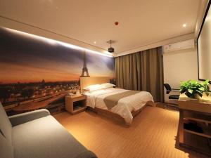 Ένα ή περισσότερα κρεβάτια σε δωμάτιο στο GreenTree Inn Zhengzhou Gongyi Xinxing Road Business Hotel +12 φωτογραφίες