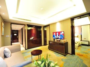TV i/ili multimedijalni sistem u objektu GreenTree Eastern Jinzhai County Lotus Hill Road Hotel